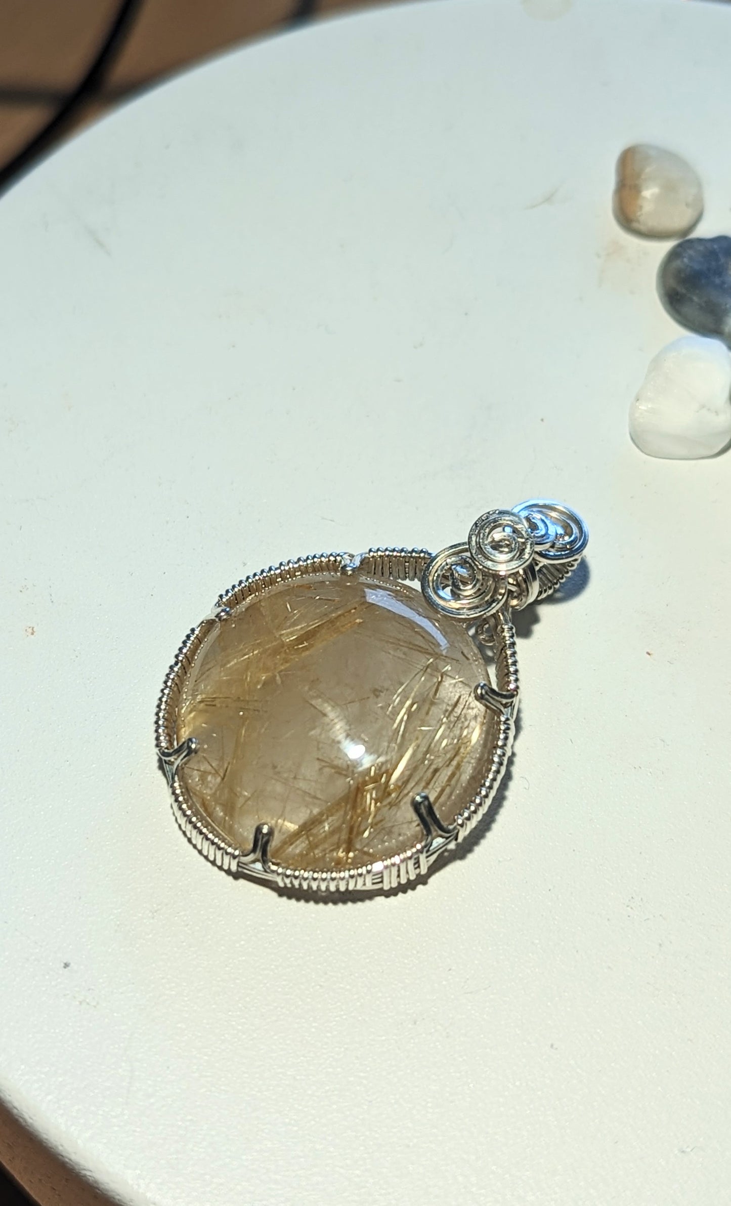 Rutilated quartz button pendant